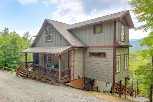 a tiny house with a porch and a balcony at Family Oasis with Game Room and 2 Decks in Blue Ridge! in Ballew Mill