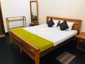 Postel nebo postele na pokoji v ubytování Mahayaya Village