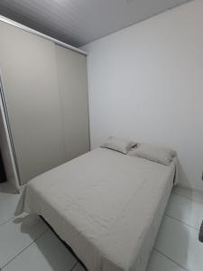 A bed or beds in a room at Casa Foz