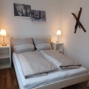 Кровать или кровати в номере Wanderfreude