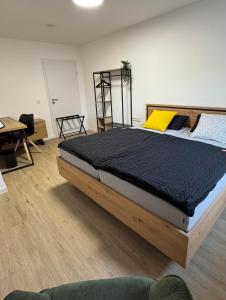 Una cama o camas en una habitación de Ferienwohnung Lemon - Suite