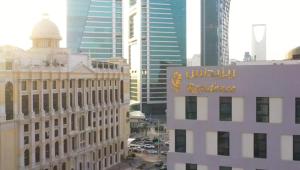 a view of a city with tall buildings at Wafa Residence in Riyadh
