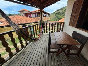 Balkón nebo terasa v ubytování Chalé Canto Da Vila Ibitipoca