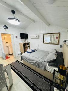 a bedroom with a large bed in a room at Cottage in Ciudad Quesada in Ciudad Quesada