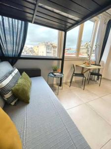 Istumisnurk majutusasutuses Ælis Suites in Psyrri - Rooftop Access & Acropolis View