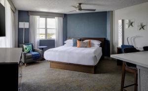 Ένα ή περισσότερα κρεβάτια σε δωμάτιο στο Beach House Suites +20 φωτογραφίες