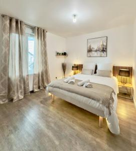 Postel nebo postele na pokoji v ubytování T1 calme et confort Avenue Garibaldi - DABNB