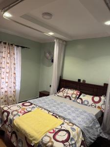 Ένα ή περισσότερα κρεβάτια σε δωμάτιο στο Maasai Villa
