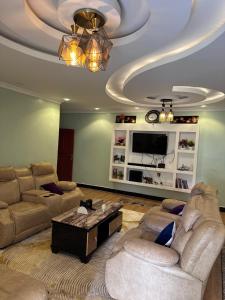 Χώρος καθιστικού στο Maasai Villa