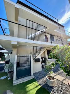 a view of a house with a balcony at 2 BEDROOM APARTMENT iN ViLLA MATEKA in Roquebrune-Cap-Martin