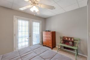 a bedroom with a bed and a dresser and a window at 3 Bed Cabin Overlooking the New River-- HOT TUB, Fire Pit, Dogs OK in Obids