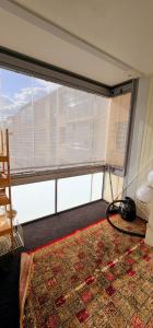 Ένα ή περισσότερα κρεβάτια σε δωμάτιο στο 3 bedrooms with 6 single beds