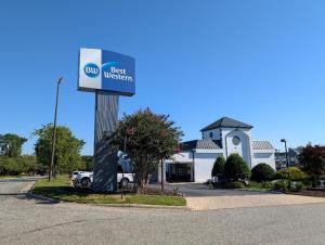 a sign in front of a best western building at Best Western Greensboro Coliseum Inn in Greensboro
