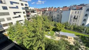 an overhead view of a city with tall buildings at Your temporary home in Vienna in Vienna