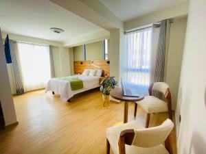 Katil atau katil-katil dalam bilik di HOTEL ALTIVA arequipa