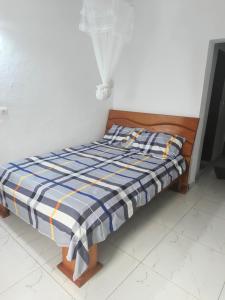 Giường trong phòng chung tại Résidence meuble