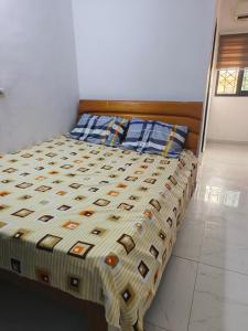 Giường trong phòng chung tại Résidence meuble