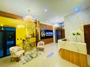 a lobby of a salon with chairs and a table at HOTEL ALTIVA - Arequipa in Cayma