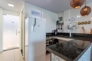 Nhà bếp/bếp nhỏ tại Estúdio 6 - Vista Incrivel em Espaço Aconchegante