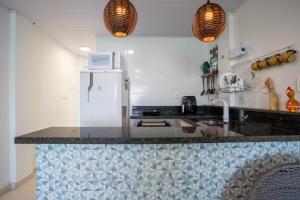 Nhà bếp/bếp nhỏ tại Estúdio 6 - Vista Incrivel em Espaço Aconchegante