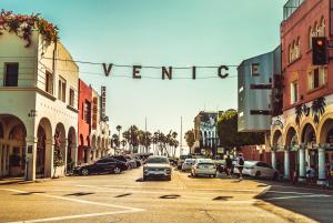 a city street with cars parked on the street at Fruit Hostel in Los Angeles