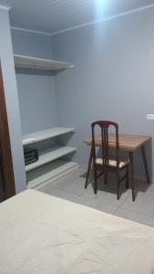 Postel nebo postele na pokoji v ubytování Kitnet mobiliada