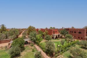 an aerial view of a campus with trees and buildings at Riad du Bab atlas in Marrakesh
