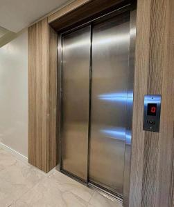 a stainless steel elevator in a building at Sleepy Taksim Hotel in Istanbul