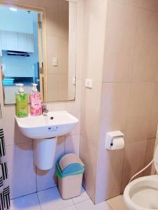 Koupelna v ubytování Inspiria Condominium