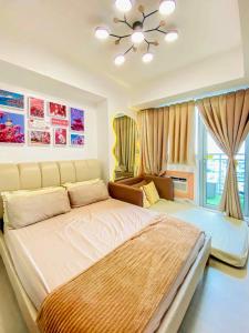 Ένα ή περισσότερα κρεβάτια σε δωμάτιο στο NG staycation Azure north pampanga +21 φωτογραφίες