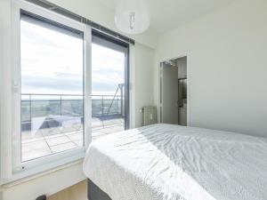 Voodi või voodid majutusasutuse Exclusive penthouse with breathtaking 360° view toas