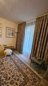 Posezení v ubytování Appartement an der Weinstraße Bad Bergzabern