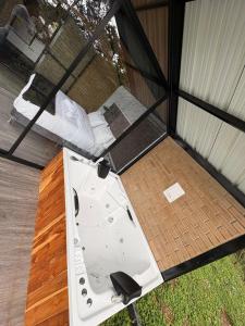 an overhead view of a room with a tub in a house at Glamping REFUGIO Guadalajara Glamping in Moniquirá +5 photos