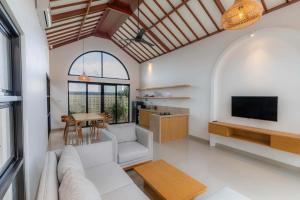 Μια τηλεόραση ή/και κέντρο ψυχαγωγίας στο Avura Villa Munggu