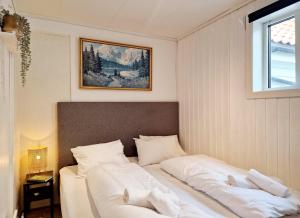 Katil atau katil-katil dalam bilik di Historic townhouse - 2 baths 3 floors 100 percent charm