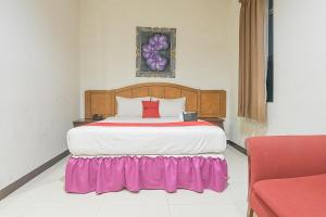 Katil atau katil-katil dalam bilik di RedDoorz Near Trans Studio Mall 3