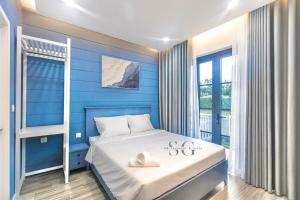 Katil atau katil-katil dalam bilik di NOVAWORLD PHAN THIẾT SG Villa