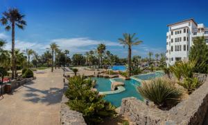 a resort with a swimming pool and a resort at SH Villa Gadea in Altea