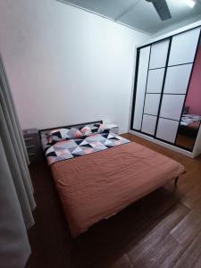 Katil atau katil-katil dalam bilik di AM Homestay Gombak