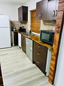 Kuchyň nebo kuchyňský kout v ubytování Hunter Valley Escape 4BR 2 Bath Work & Leisure