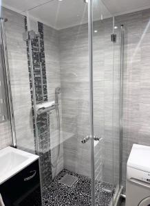 Koupelna v ubytování Cozy city apartment Tallinn + 3 fotografie