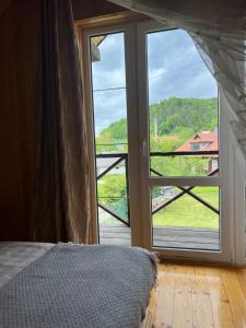 Postel nebo postele na pokoji v ubytování Заворіття