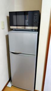 Kuchyň nebo kuchyňský kout v ubytování Kokusaigakusya Ozukikaikan - Vacation STAY 18798