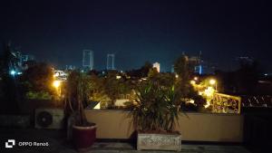 a view of a city skyline at night at Hotel Star Islamabad in Islamabad +48 photos
