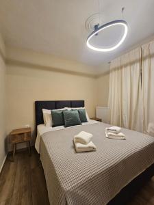 Ένα ή περισσότερα κρεβάτια σε δωμάτιο στο A for living