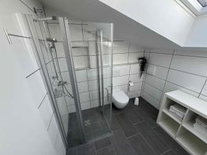 Ένα μπάνιο στο Ferienwohnung am Luegsteinsee +6 φωτογραφίες
