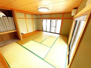 Postel nebo postele na pokoji v ubytování West Lake Villa Imazu Umehara - Vacation STAY 18948