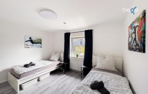 Ένα ή περισσότερα κρεβάτια σε δωμάτιο στο BEGE APARTMENTS Your Cozy Flat