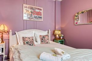 Ένα ή περισσότερα κρεβάτια σε δωμάτιο στο Appartement Friends