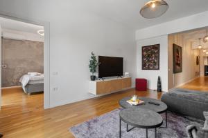 TV a/nebo společenská místnost v ubytování Designer Flat North & Parking